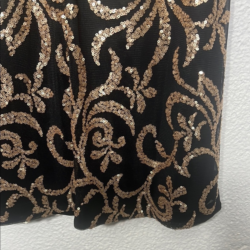 Jessica Simpson - Elegant Black and Gold sequence Dress size 10
Worn once - Picture 7 of 7